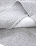 A close-up of a grey crew fleece sweatshirt showing the soft interior fabric and detailed stitching.