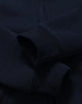 A navy blue kid's full-zip fleecy hoodie with a soft texture and cuffed sleeves. Features a logo.