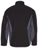 A softshell jacket in black with grey contrast panels, featuring a logo on the sleeve.