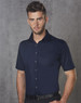 A short-sleeved navy blue button-up shirt with a pocket and a logo on the chest.