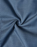 A close-up of a blue fabric with a pin dot pattern, showcasing its stretch and texture.