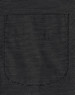 A black pin dot fabric with a pocket detail. The texture features small, contrasting dots.