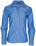 A blue long sleeve button-up shirt featuring a collar and a logo at the neckline.