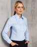 A light blue women's fine twill button-up shirt with a collar and long sleeves, featuring a logo.