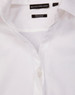 A white long-sleeved button-up shirt with a dobby striped pattern and a brand logo on the label.