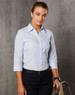A light blue button-up shirt with 3/4 sleeves, featuring a collar and a fitted design. The shirt has a logo.