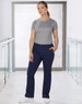 Ladies' solid colour scrub pants in navy, worn with a grey top, featuring a logo on the top.