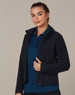 A navy polar fleece jacket with a zip front and high collar, worn over a blue polo shirt. It features a logo.
