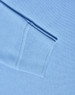 A light blue long sleeve polo shirt made from poly/cotton pique knit, featuring ribbed cuffs.