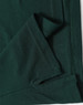 A dark green men's polo shirt featuring a folded hem and stitching details, including a logo.