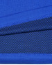 A close-up of blue bamboo charcoal fabric with textured patterns and a visible logo.