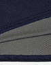 A close-up of a navy polo shirt detailing with a grey mesh inner lining, featuring a logo.