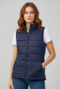 A navy women's alpine vest featuring a zip front, padded design, and side pockets. The model is wearing a white T-shirt underneath.