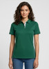 A green women's short sleeve polo shirt with a collar and branding, paired with light blue jeans.