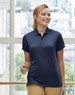 A navy blue ladies' short-sleeve polo shirt with a collar and a logo, set against a bright, modern background.
