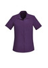 A short sleeve women's shirt in a rich purple hue with a single chest pocket and a button-up front.