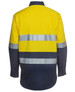 A long-sleeve work shirt in bright yellow and navy blue with reflective stripes and a logo.