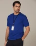 A men's semi-fitted t-shirt in royal blue, featuring short sleeves and a tag attached.
