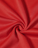 A close-up view of red fabric with a textured pattern, depicting the lightweight material of a performance t-shirt.
