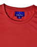 A red lightweight performance women's T-shirt with a round neckline and a logo on the label.