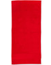 A red terry velour beach towel measuring 75x150 cm, with a solid colour design and a logo.