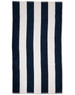 A striped beach towel featuring alternating navy blue and white stripes, with a logo at one corner.