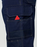Navy blue semi-fitted Cordura work pants featuring multiple pockets, including a visible pocket with a red item.
