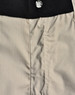 Rip-stop poly/cotton stretch work shorts in beige, featuring a black waistband and a button closure.