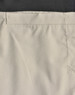 Rip-stop poly/cotton stretch work pants in a light beige colour with a black waistband and stitching details.