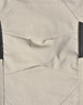 Light grey fabric of work pants featuring detailed stitching and black accents, with a logo present.