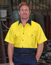 A short-sleeved Hi-Vis work shirt in yellow and navy with a logo and button details.