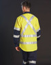 A two-tone work shirt featuring reflective tape, primarily in yellow with navy blue sleeves.