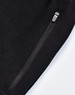 A pair of black poly/cotton terry sweat pants featuring a zip pocket and a soft texture.