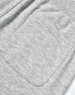 A close-up of grey poly/cotton terry sweat pants featuring a single back pocket and elastic waistband.