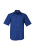 A blue short sleeve button-up shirt with a pocket and a logo on the chest.
