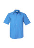 A short sleeve button-up shirt in a vibrant blue colour, featuring a chest pocket and a branded label.