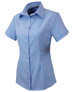 A light blue button-up shirt for ladies, featuring short sleeves and a collar. The shirt has a logo.