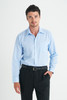 A light blue men's long sleeve button-up shirt with a chest pocket, paired with black trousers.