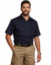A navy short-sleeved cotton work shirt with two chest pockets, worn by a smiling man.