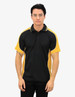 A man stands wearing a black and yellow polo shirt with a logo on the chest. The shirt features contrast piping.