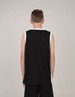 A black unisex basketball singlet with a white trim, viewed from the back.