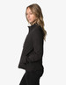 A black women's soft shell jacket made of three-layer bonded fabric, featuring a collar and side pockets.