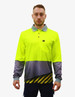A bright yellow work polo shirt with patterned grey sleeves and a pocket, featuring a logo.