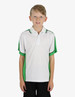A boy stands wearing a white polo shirt with green accents and a logo on the chest.