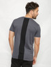 A grey t-shirt featuring a black back panel, designed for a stylish look. It has a branding logo.