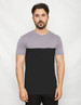 A two-toned t-shirt featuring a grey upper half and a black lower half, displayed on a model against a neutral background.