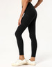 Black ladies' leggings with a high waist and fitted design, paired with white sneakers. Features a logo.