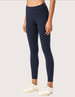 Navy ladies' leggings with a high waist, paired with white athletic shoes. The product has a visible logo.
