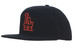 A black A-frame cap with an embroidered logo in red. It features a flat brim and a structured design.
