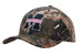 A camouflage 6-panel cap featuring a logo, with a mix of greens, browns, and natural patterns.